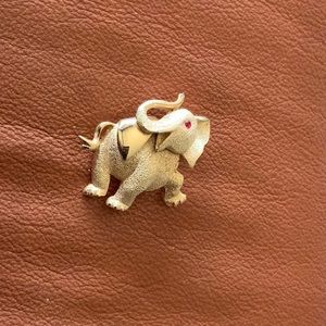 Unsigned Charming Gold Tone Elephant Pin With Sparkly Red Eye
